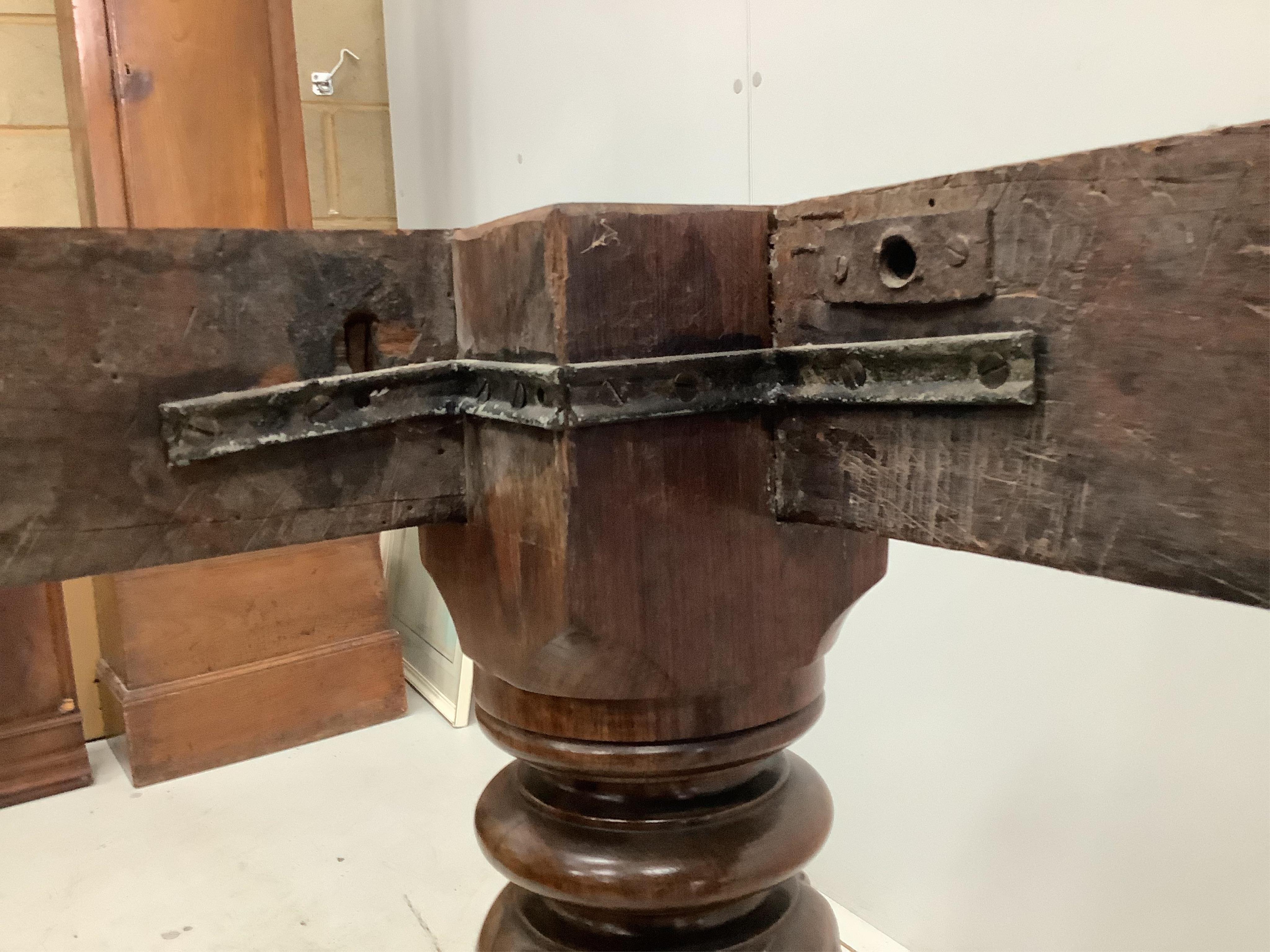 An Indian padouk wood circular top dining table, diameter 152cm, height 74cm. Condition - table has seen some reconstruction, repolished and now good condition